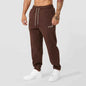 Men's black athletic joggers with side stripe, made by Mead's Supply & Equipment Outfitters, featuring comfortable track sweatpants.