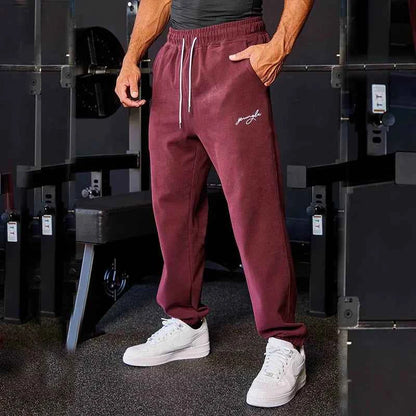 Men's black athletic joggers with side stripe from Mead's Supply & Equipment Outfitters, featuring a comfortable fit and sporty style.