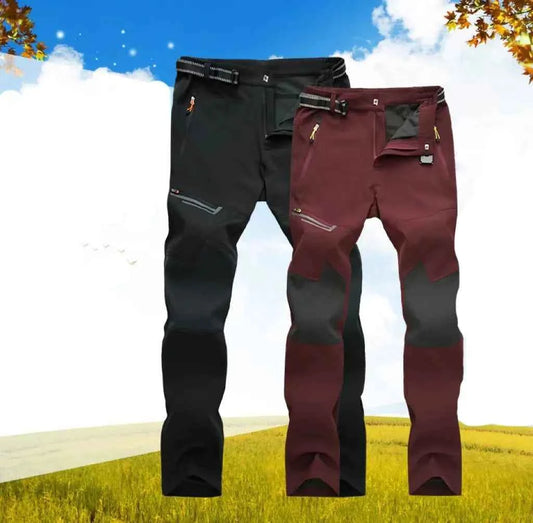 Unisex waterproof hiking pants by Mead's Supply & Equipment Outfitters, breathable polyester, black, suitable for outdoor adventures.
