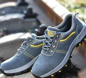 Men's lightweight breathable steel toe safety work shoes in blue, with protective footwear design by Mead's Supply & Equipment Outfitters.