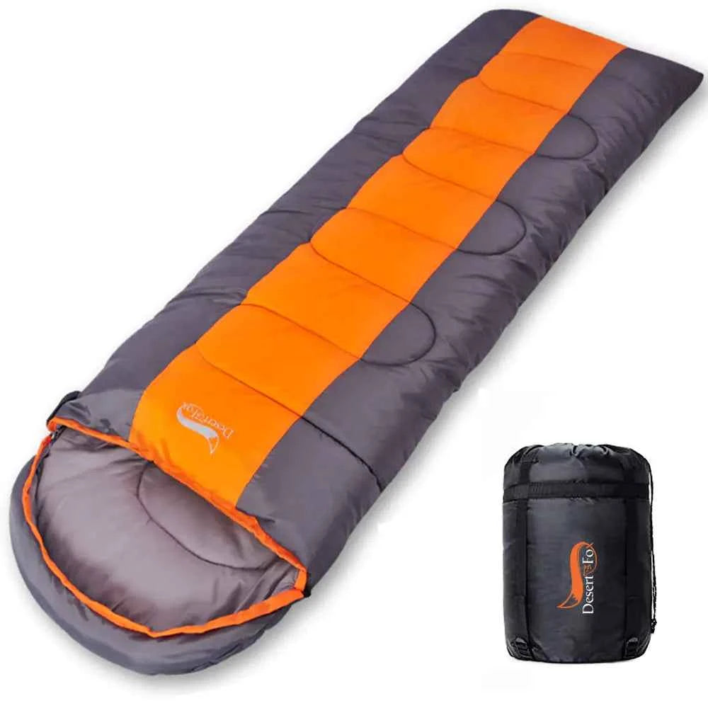 Green outdoor sleeping bag by Mead's Supply for camping, suitable for single or double use, lightweight and durable.
