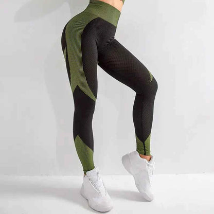 Black seamless hollow women's yoga pants by Mead's Supply & Equipment Outfitters, moisture-wicking breathable athletic leggings.
