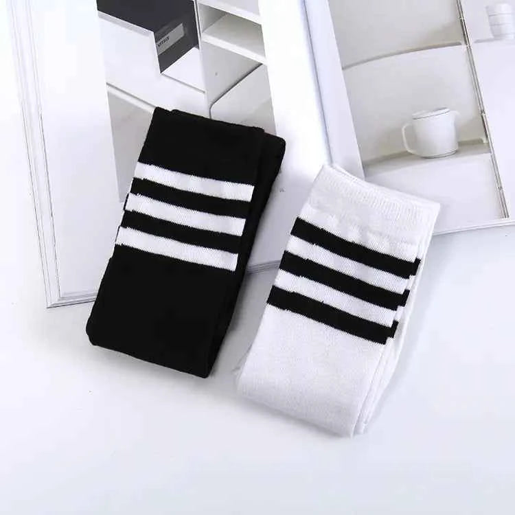 Blue and white striped over-the-knee socks for women, college style knee-high fashion socks by Mead's Supply & Equipment Outfitters.