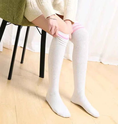 Blue and white striped over-the-knee socks for women, college style knee-high fashion socks by Mead's Supply & Equipment Outfitters.