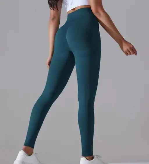 Brown knitted high waist yoga pants for women by Mead's Supply & Equipment Outfitters, soft stretch activewear for comfortable movement.