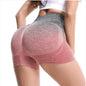 Women's high-waist gradient yoga shorts by Mead's Supply & Equipment Outfitters, green athletic workout shorts for gym and fitness.