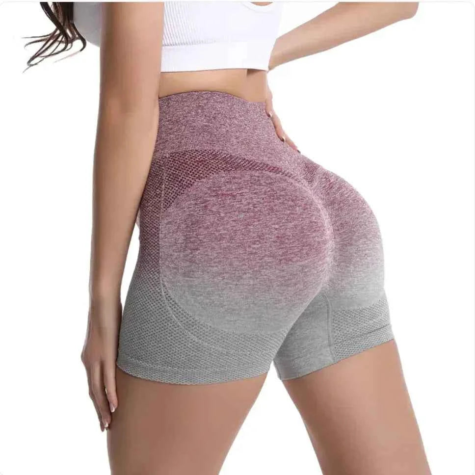 Women's high-waist gradient yoga shorts by Mead's Supply & Equipment Outfitters, green athletic workout shorts for gym and fitness.
