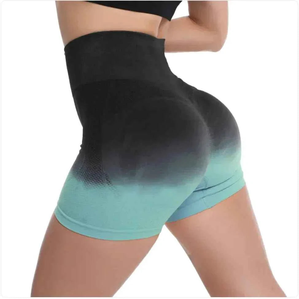 Women's high-waist gradient yoga shorts by Mead's Supply & Equipment Outfitters, green athletic workout shorts for gym and fitness.