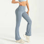 Gray high waist flared yoga pants by Mead's Supply & Equipment Outfitters with hip-lifting bell bottom design, women's athletic wear.