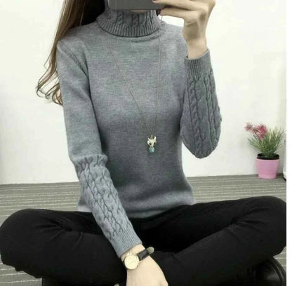 Women's wool high neck sweater with slim fit and long sleeves, designed for winter warmth, by Mead's Supply & Equipment Outfitters.