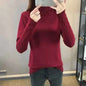 Women's wool high neck sweater by Mead's Supply & Equipment Outfitters, slim fit, long sleeves, perfect for winter warmth.