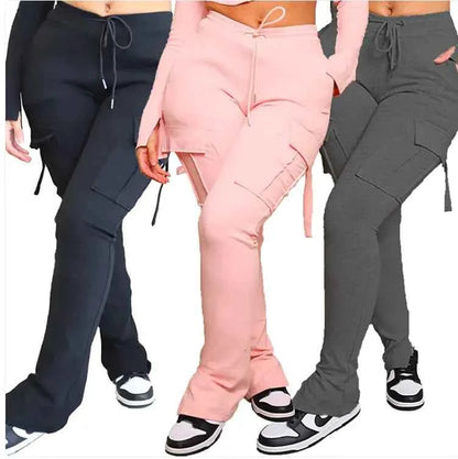 Pink high-waist utility cargo pants for women with wide legs, multiple pockets, and drawstring waist by Mead's Supply & Equipment Outfitters