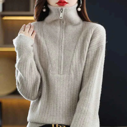Women's red 100% Merino wool turtleneck sweater with zipper front, loose fit, designed for winter warmth by Mead's Supply & Equipment Outfitters.