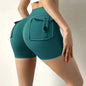 Women's high waist stretch yoga shorts by Mead's Supply & Equipment Outfitters, quick-dry athletic shorts for gym and fitness.