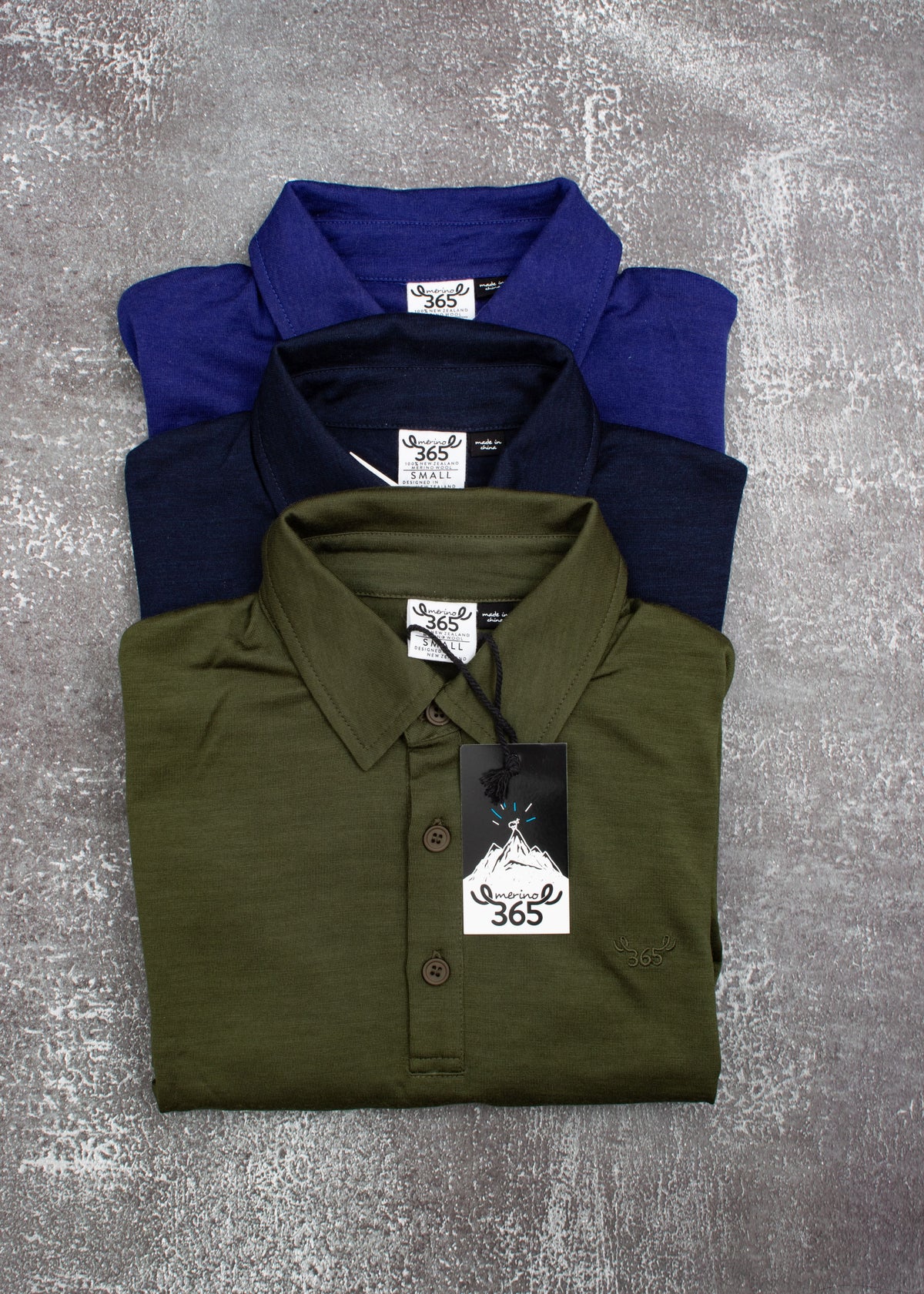 Men's black polo shirt made from 100% Merino wool by Merino 365 NZ, showcasing the soft, fine knit fabric and classic polo style.
