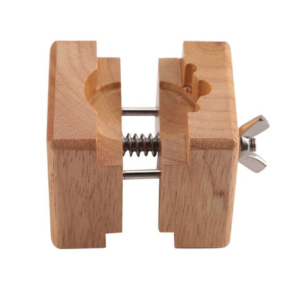Professional watch vice from That Watch Shop, a precision tool for securely holding watches during repair or maintenance.
