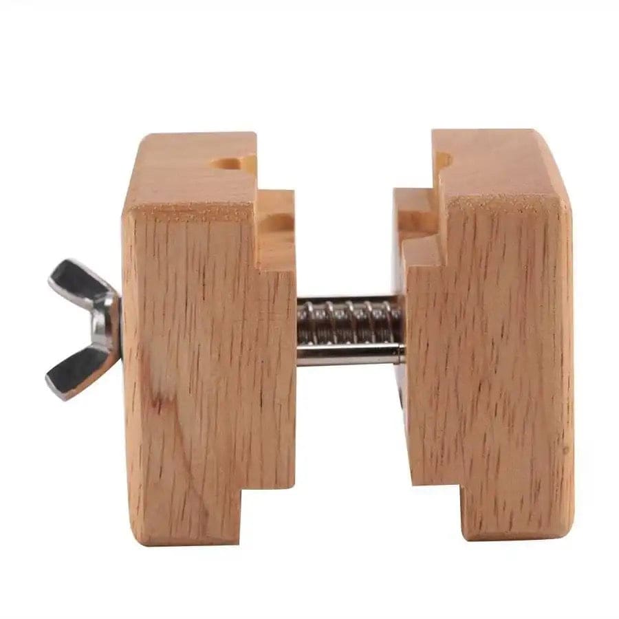 Professional watch vice from That Watch Shop used for secure watch repair and maintenance, with adjustable grips and durable construction.