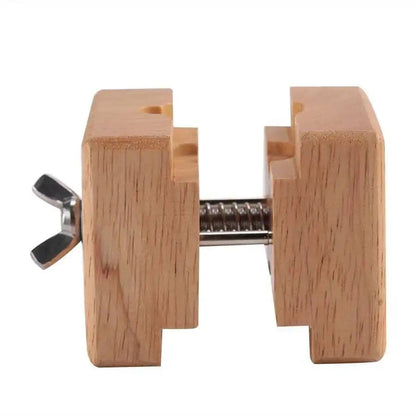 Professional watch vice from That Watch Shop used for secure watch repair and maintenance, with adjustable grips and durable construction.