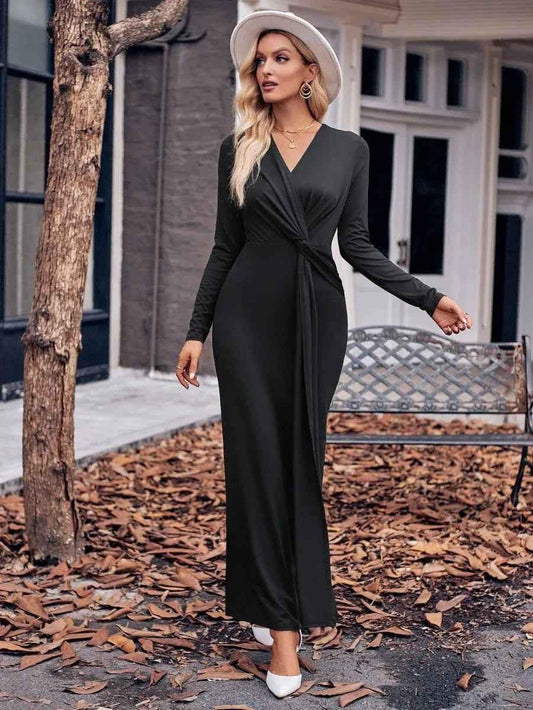 Black women's solid V-neck waist dress by Stylish 3Sixty5, featuring a chic and fitted design for elegant occasions.