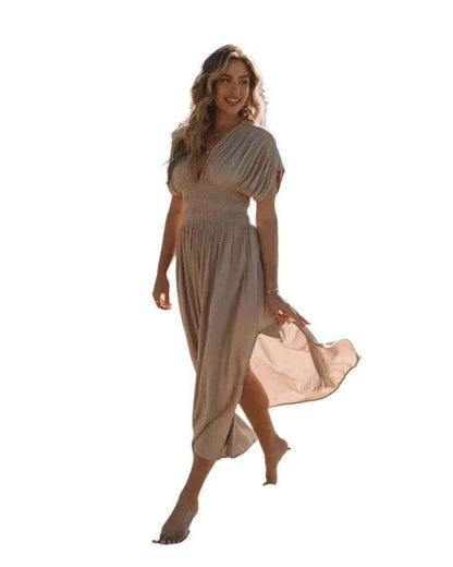 Stylish 3Sixty5 khaki summer dress with a slit, featuring a chic design and lightweight fabric for warm weather wear.