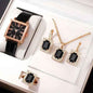 Stylish 3Sixty5 Diva-Shine Diamond Quartz Watch Set featuring a black jewelry set with a watch and matching accessories.