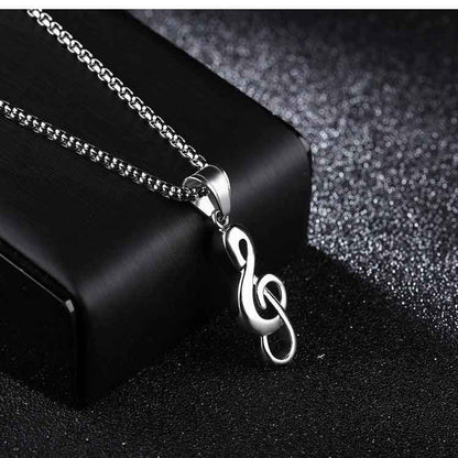 Gold minimalist music note necklace by Stylish 3Sixty5, unisex jewelry with a sleek chain and elegant design.