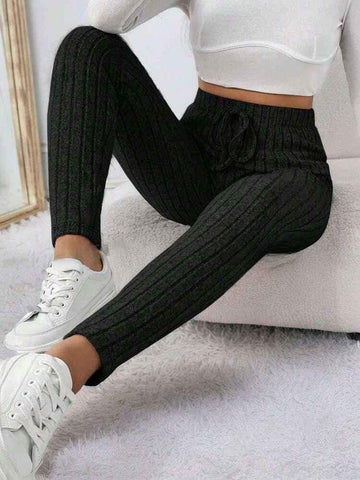 Black women's chic stretch yoga pants by Stylish 3Sixty5, featuring a fitted design and comfortable fabric for active wear.