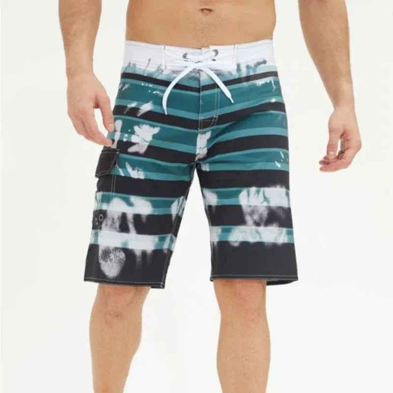 Stylish 3Sixty5 Ocean Drift plus size beach shorts with a tropical print, lightweight fabric, and comfortable fit for summer days.