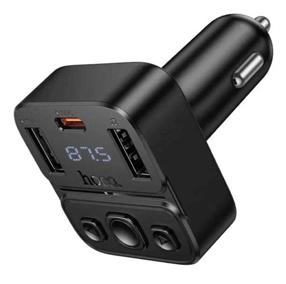 Techplus Hoco E87 dual port 35W car Bluetooth FM transmitter connected to a vehicle's dashboard, with LED display and control buttons.