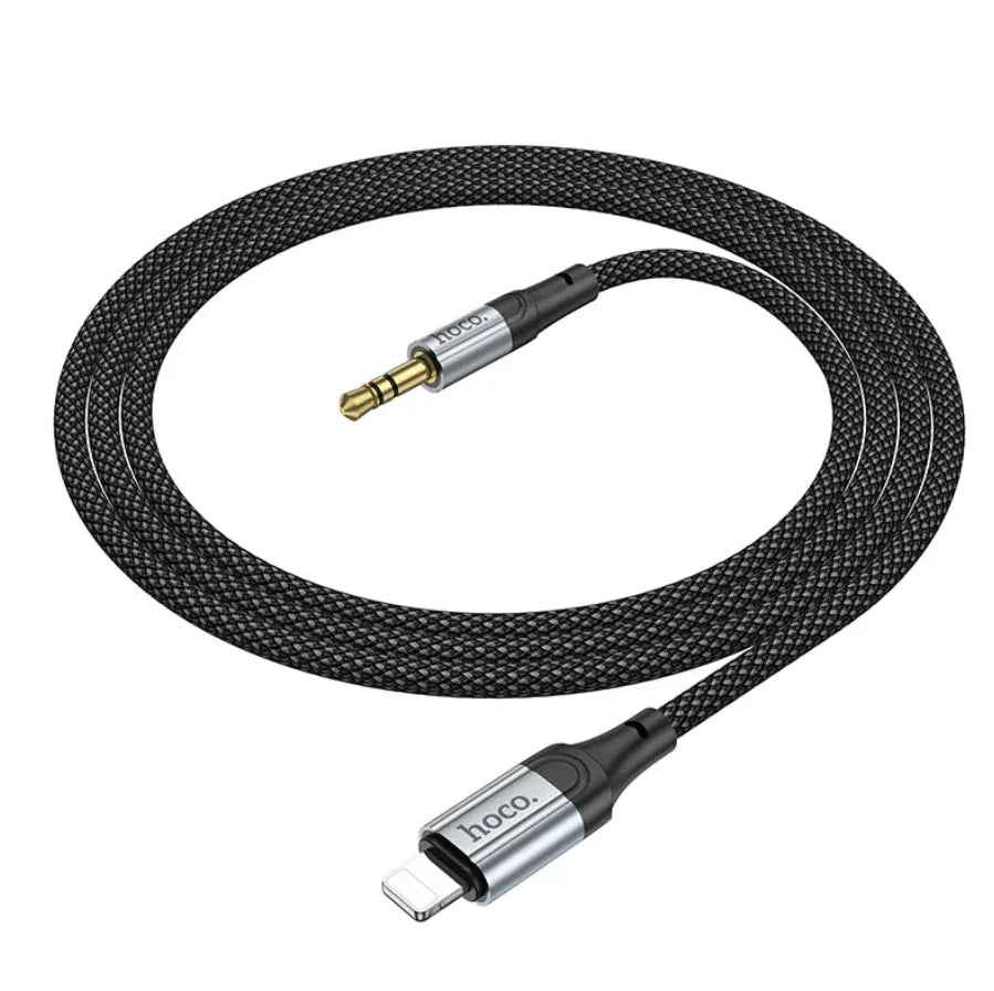 Techplus Hoco Lightning to 3.5mm Aux Cable UPA26 connected to a smartphone for audio connection.