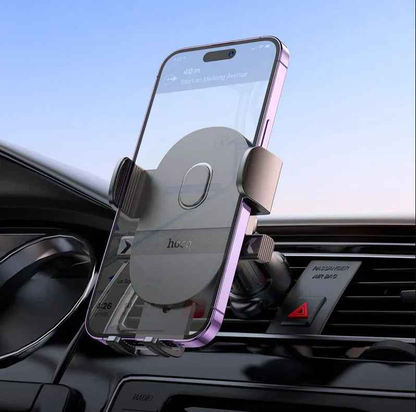 Techplus universal gravity car phone holder with air vent clamp mount, adjustable for smartphones and secure in vehicles.