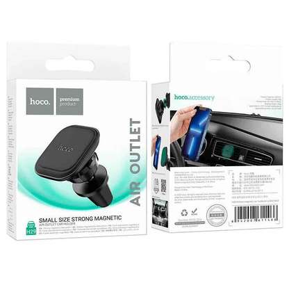 Techplus Hoco H29 magnetic air vent phone holder mounted on a car vent with a mobile phone securely held by a strong magnet.