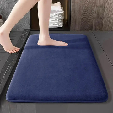 Habicare thick absorbent bathroom mat with non-slip solid color design, suitable for floor and door use, available in five colors.
