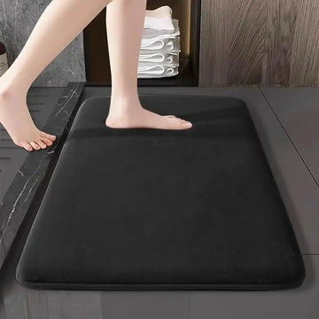 Habicare thick absorbent bathroom mat in solid color, non-slip design for floor and door use, available in five colors.