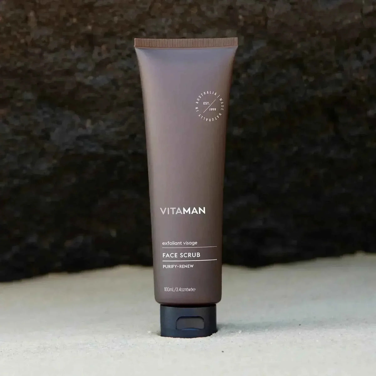 VITAMAN Australia face scrub in a skincare container, showcasing the product's textured exfoliating formula for clean, refreshed skin.