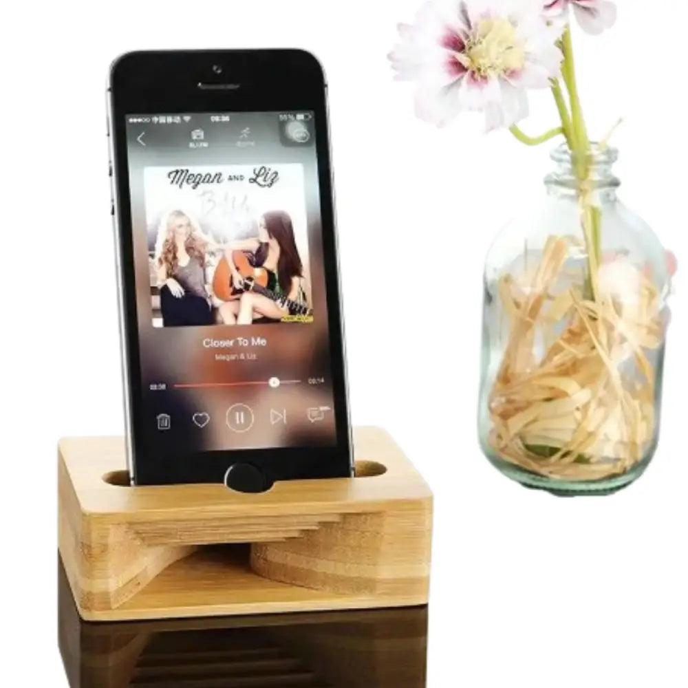 Wooden 9eight5 phone stand and sound amplifier by Habicare, featuring eco-friendly wood design and built-in sound enhancement.